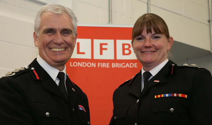 Previous Commissioner Ron Dobson with new Commissioner Dany Cotton (both smiling)