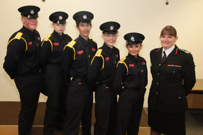 Five fire cadets stood in a line next to Commissioner Dany Cotton 