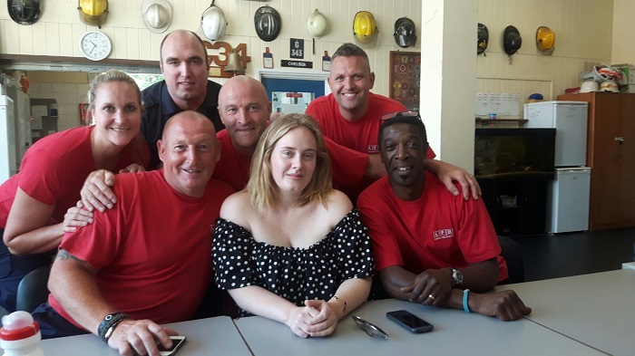 Singer, Adele sat with firefighters from Chelsea fire station