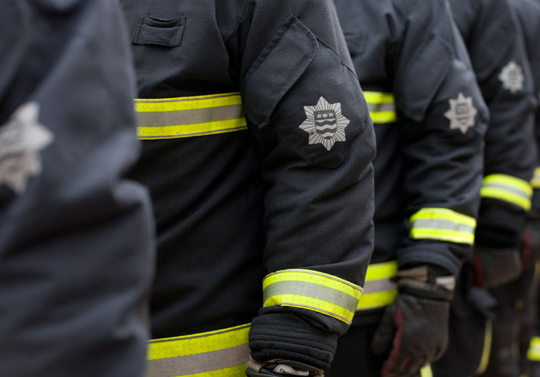 Close up of LFB Firefighter badge 