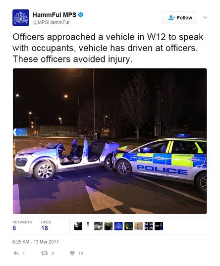 Traffic collision between civilian car  and police car , tweet screenshot