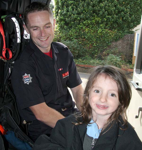 Poppy, the little girl that was saved in the cab of a fire engine with one of the firefighters that helped save her