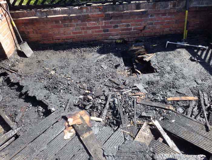 The remains of a garden terrace after it was destroyed by a sunshine blaze 