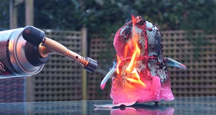 Youtuber burning toy with blowtorch 