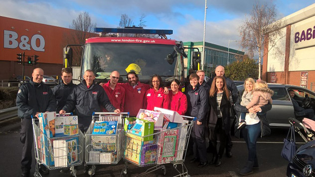 Firefighters buying Christmas presents for the Children's ward at King George Hospital