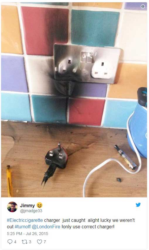 Screenshot of a tweet of a faulty charger that has exploded and burnt the plug socket