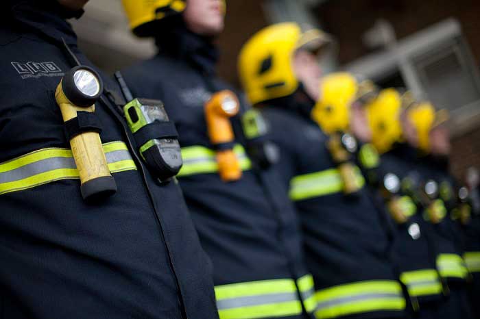 Firefighters in their uniform 