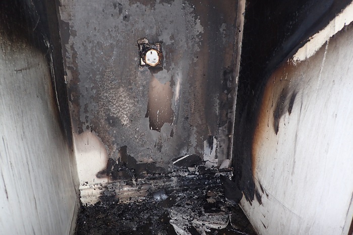 Damage wall due to tumble dryer fire 