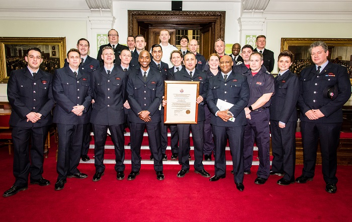 Firefighters from Islington fire station picking up award