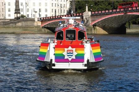 London Fire Brigade fire boat wrapped in the rainbow flag for Pride 2018