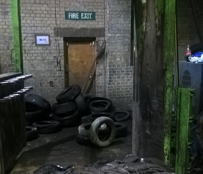 Tyres blocking a fire exit