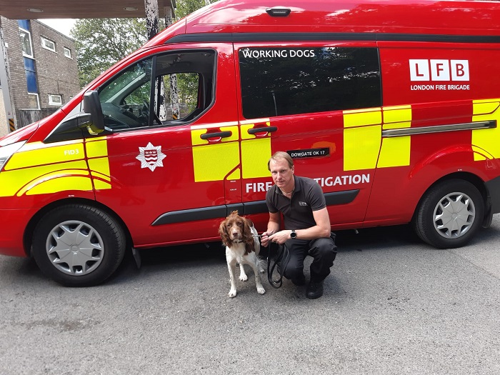 Watson and his handler, Fire Investigation Officer Darren Woodhams