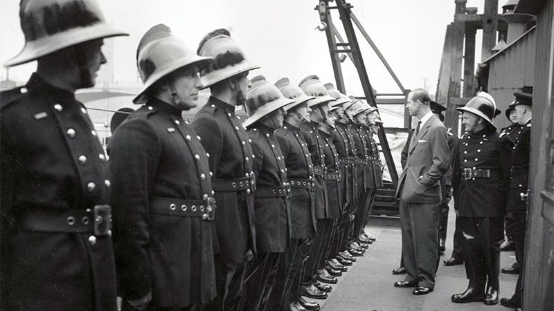 The then Duke of Edinburgh meeting river firefighters in the 1950s