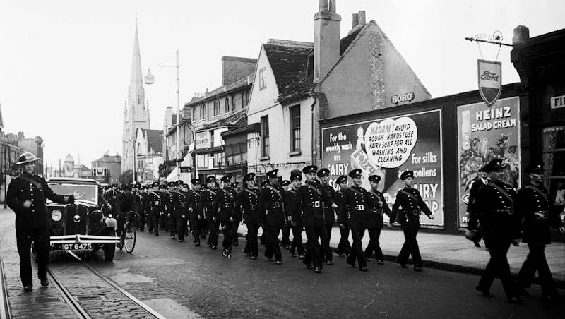 Lfb And Afs Firefighters Marching Together Along Lewisham High Street In 1940