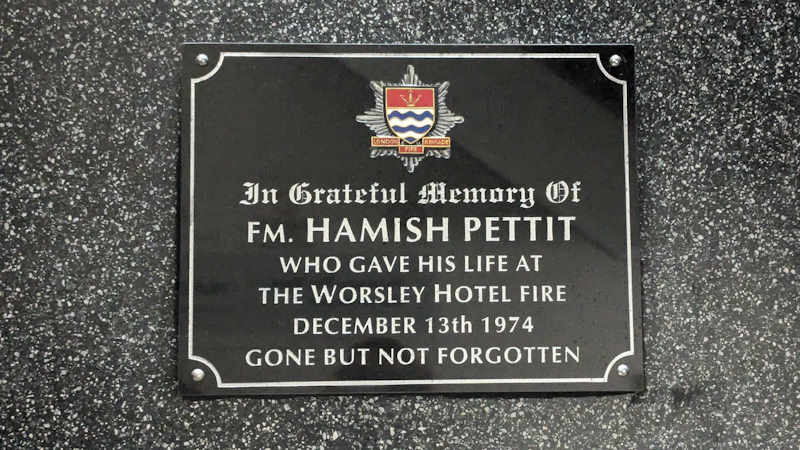 Memorial plaque for Fireman Hamish Pettit who died at the Worsley Hotel fire in 1974. The plaque is located inside Paddington Fire Station